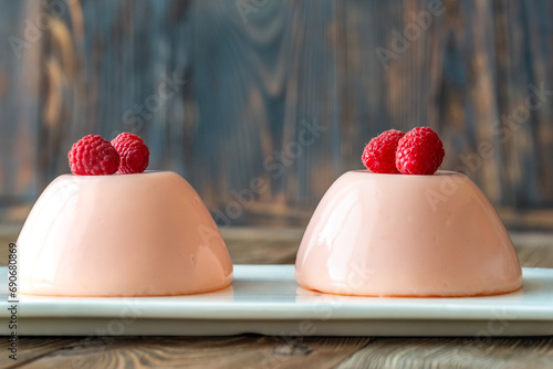 Dessert puddings with raspberries