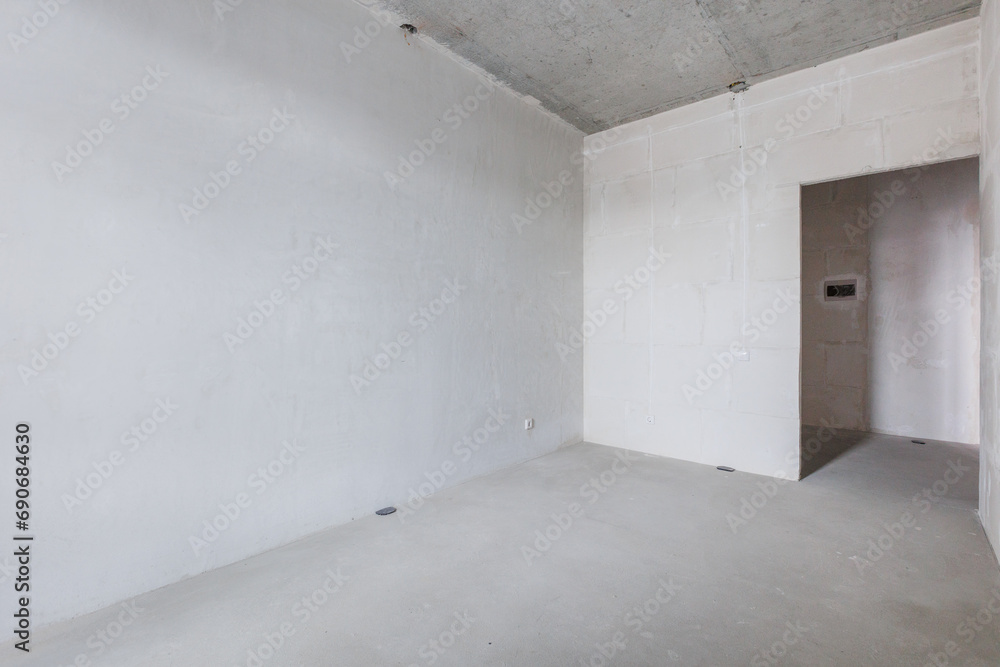 interior of the apartment without decoration in gray colors. rough finish interior of the apartment without decoration in gray colors. rough finish