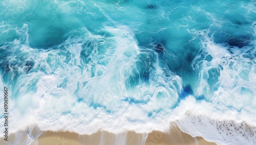 An aerial view of the ocean waves and sand © pham