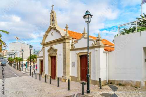 The small Orthodox Ermida de Nossa Senhora da Conceição dos Inocentes Church in the seaside town of Cascais, Portugal. photo