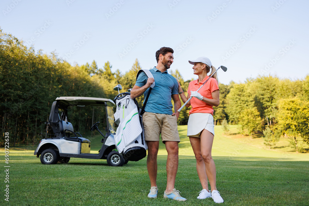 Sporty Romance: Young Couple at the Golf Course