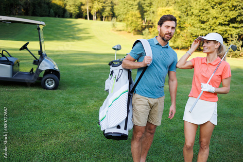 Young Couple Enjoying Golf Course Adventure