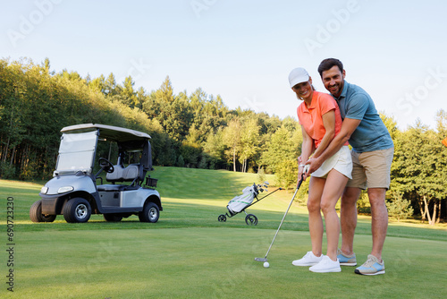 Last Hole Joy: Young Couple Golfing
