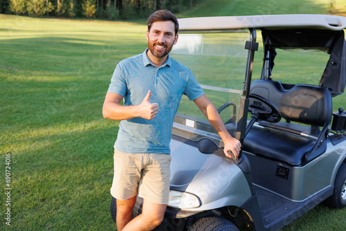 Golfer Shows Approval on Green beside Cart