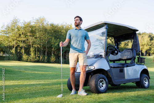 Sporty Golfer Near Golf Cart