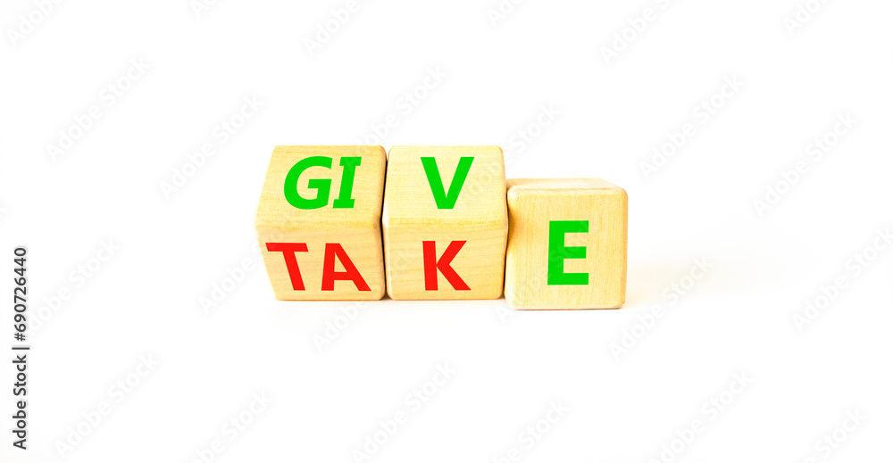 Give or take symbol. Concept word Give or Take on wooden cubes. Beautiful white table white background. Business give or take concept. Copy space. Give or take symbol. Concept word Give or Take on wooden cubes. Beautiful white table white background. Business give or take concept. Copy space.