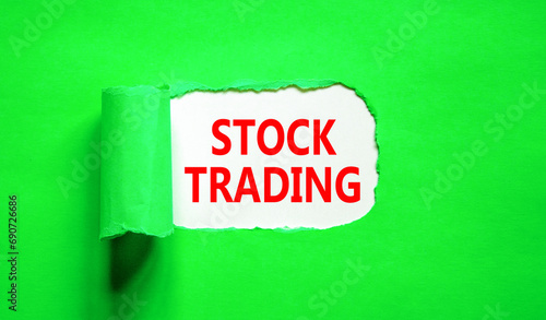 Stock trading symbol. Concept words Stock trading on beautiful white paper. Beautiful green paper background. Business stock trading concept. Copy space.