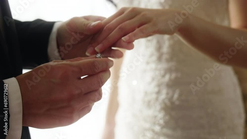 Valentine's Promise, Close Up of Romantic Wedding Ring Exchange photo