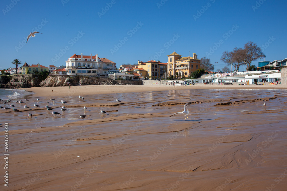 Beach, town and dock of Cascais at winter, Portugal