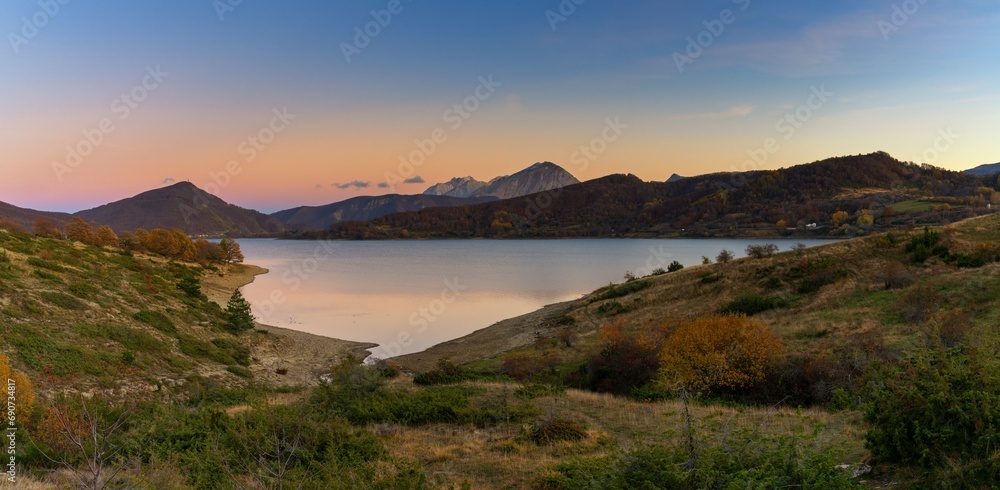 panorama landscape of Lago di Campotosto in Abruzzo at sunset