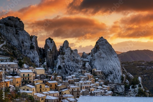 village of Castelmezzano in the Piccolo Dolomiti region of southern Italy at sunrise in winter photo