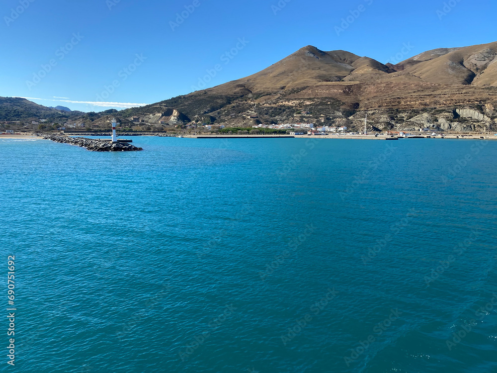 Panoramic view from the ferry on the island of Gokceada at Kuzulimani harbour, Canakkale, Turkey Panoramic view from the ferry on the island of Gokceada at Kuzulimani harbour, Canakkale, Turkey