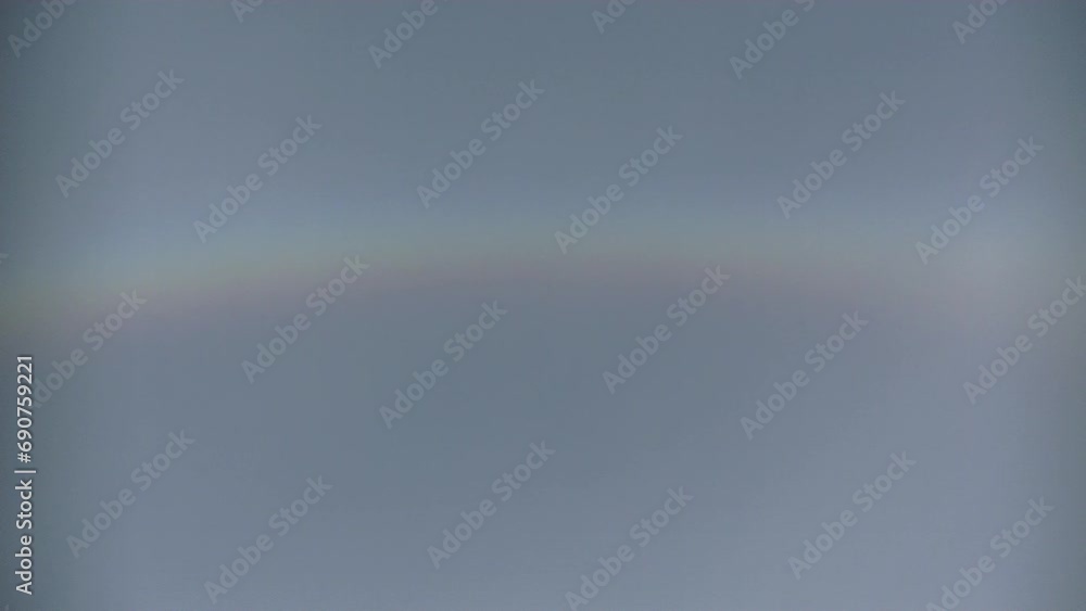 Natural sky background with moving clouds Cirrostratus and arc of halo - timelapse. Topics: optical phenomenon, weather, meteorology, atmosphere, climate, sun energy, natural colors Natural sky background with moving clouds Cirrostratus and arc of halo - timelapse. Topics: optical phenomenon, weather, meteorology, atmosphere, climate, sun energy, natural colors