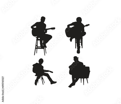 silhouettes of musicians  plays the guitar on a white background