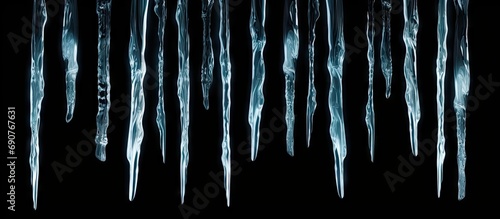 Sharp icicles isolated on b...