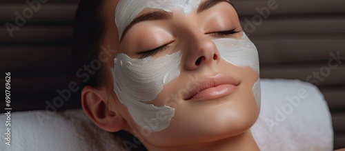 Spa therapy for young woman having cosmetic mask at beauty salon. Copyspace image. Square banner. Header for website template photo