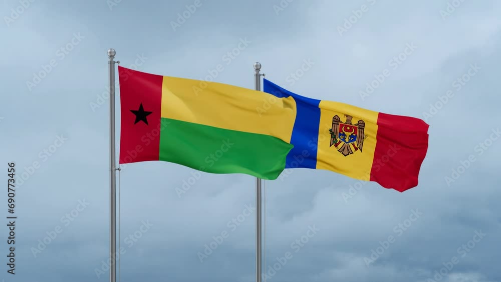 Moldova and Guinea-Bissau flag waving together on cloudy sky, endless seamless loop, two country cooperation concept Moldova and Guinea-Bissau flag waving together on cloudy sky, endless seamless loop, two country cooperation concept