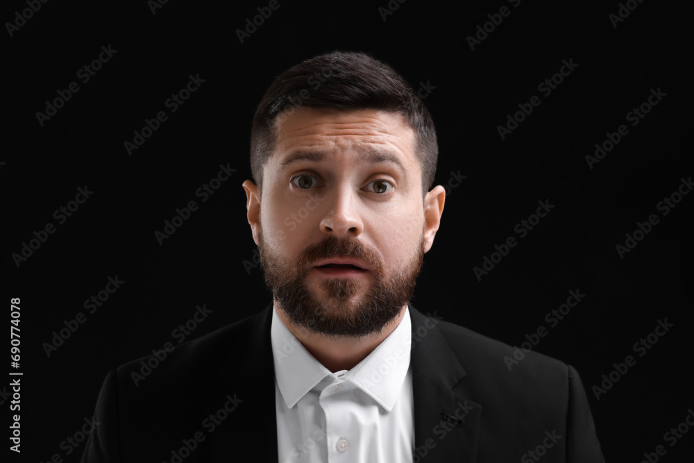 Personality concept. Emotional man on black background Personality concept. Emotional man on black background