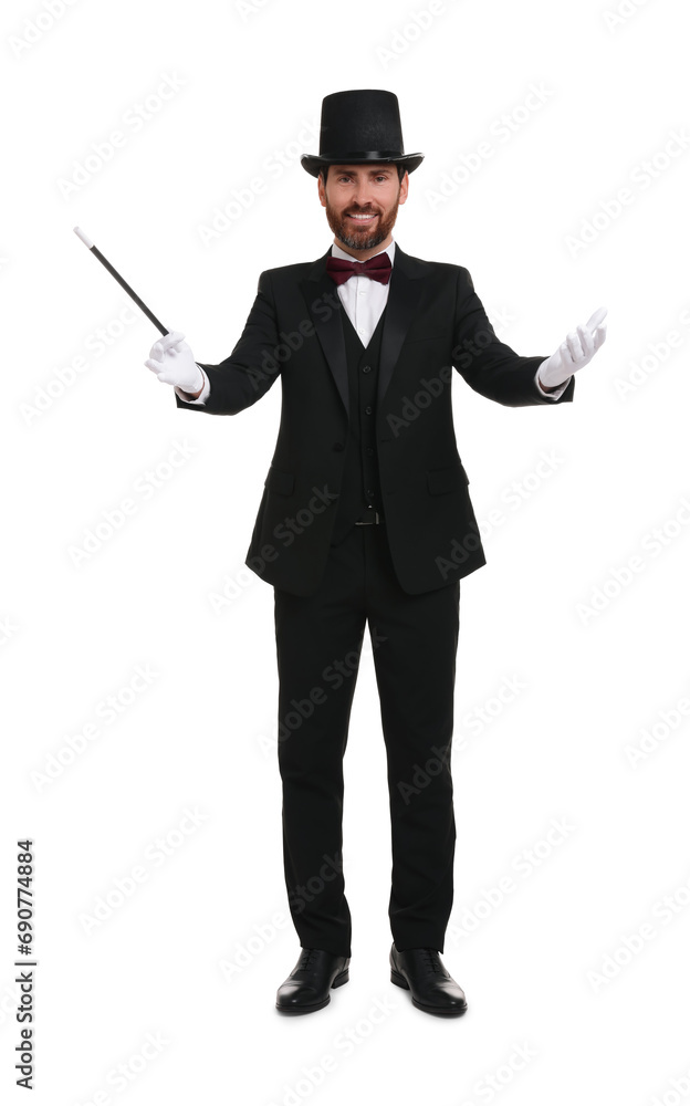 Happy magician in top hat holding wand on white background Happy magician in top hat holding wand on white background
