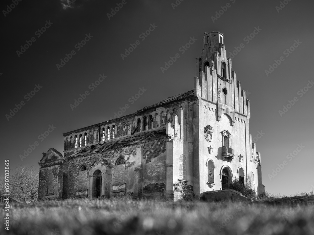 low point view to abandoned cathedral in sunny day in vintage style
