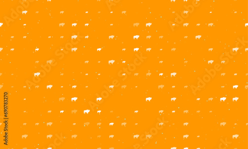 Seamless background pattern of evenly spaced white buffalo symbols of different sizes and opacity. Vector illustration on orange background with stars