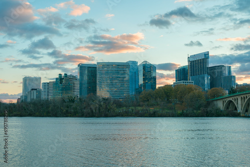 View of the Rosslyn skyline and Potomac River at sunset from Georgetown Waterfront Park, Washington, District of Columbia