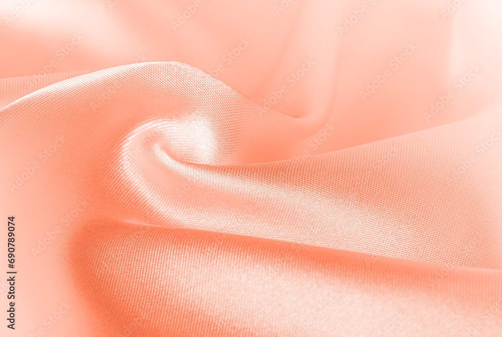 Color of the year 2024 Peach Fuzz 13-1023. Peach fuzz color silk texture, background. Color of the year 2024 Peach Fuzz 13-1023. Peach fuzz color silk texture, background.