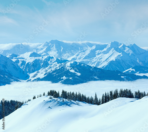 Cloudy sunny winter mountain landscape © wildman