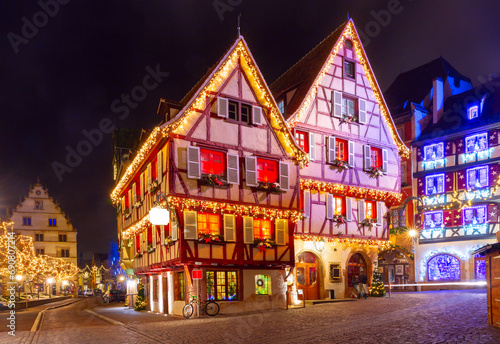 Decorated and illuminated half-timbered house in Old Town at Christmas night  Colmar  Alsace  France