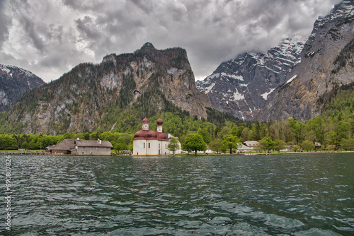 Monastery on the lake in front of a mountain