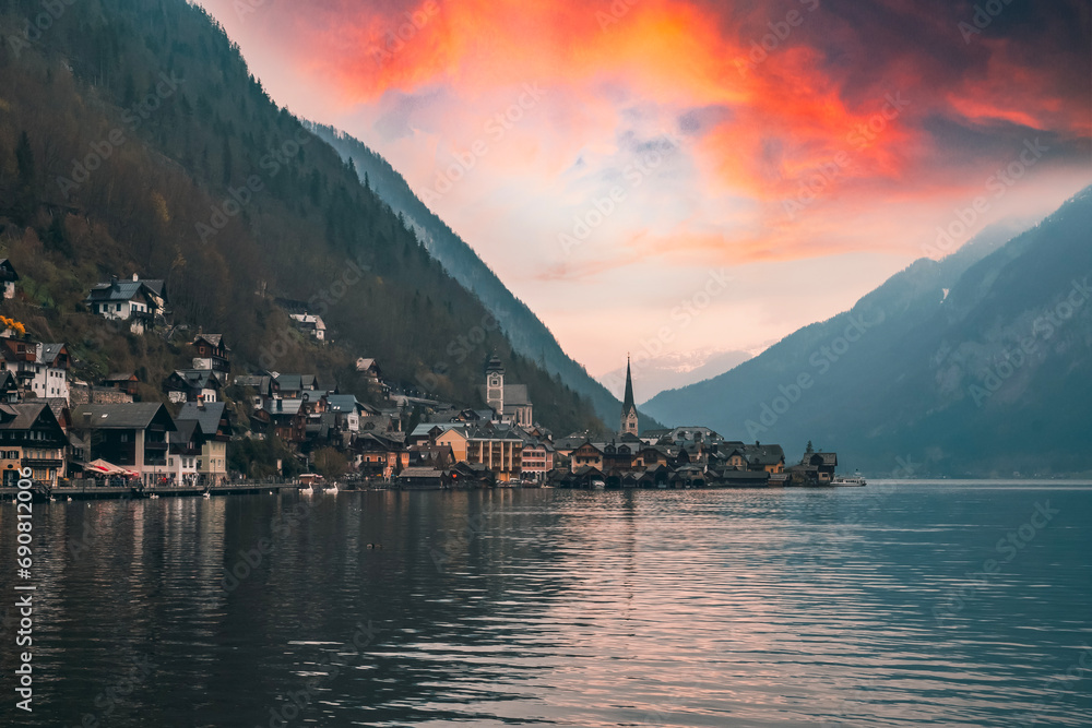 Great promotional photos of Austrian dream town Hallstatt landscapes with fantastic sunset colors and clouds in winter season
