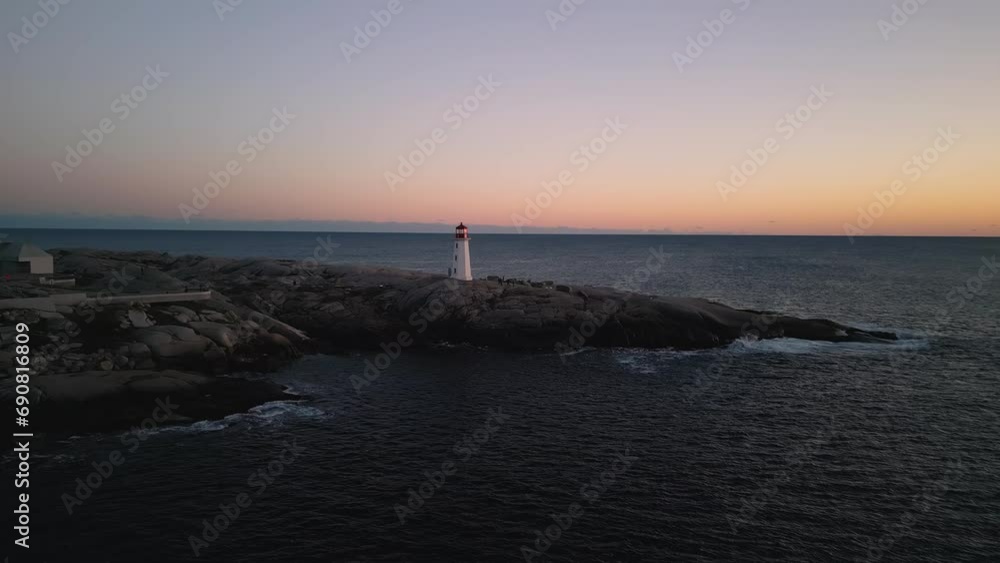 Aerial view Peggy's Cove Lighthouse at dusk Atlantic Coast Nova Scotia Canada Aerial view Peggy's Cove Lighthouse at dusk Atlantic Coast Nova Scotia Canada