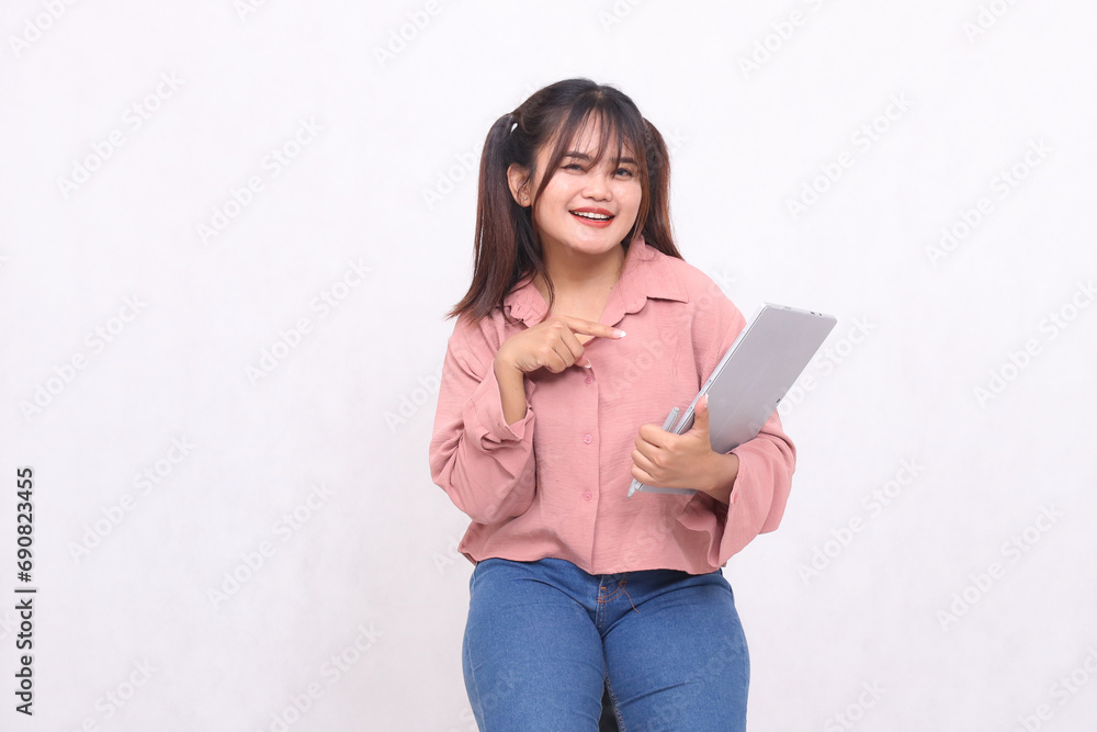 Business, finance and work Improvement projects successful Asian businessman cheerful professional stylish woman using laptop holding notebook pointing to notebook looking at camera on white bg Business, finance and work Improvement projects successful Asian businessman cheerful professional stylish woman using laptop holding notebook pointing to notebook looking at camera on white bg