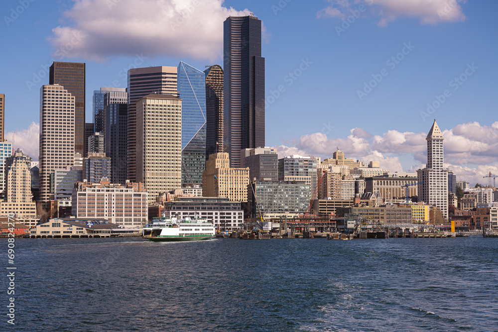 Fototapeta premium 2021-03-10 SEATTLE SKYLINE WITH COLUMBIA TOWER SMITH TOWER AND OTHER OFFICE BUILDINGS DOWNTOWN WITH A WASHINGTON STATE FERRY AND ELLIOTT BAY 