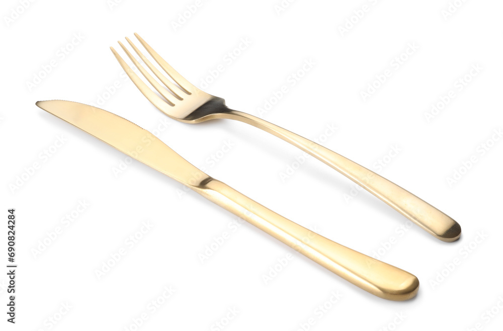 Shiny golden fork and knife isolated on white. Luxury cutlery Shiny golden fork and knife isolated on white. Luxury cutlery