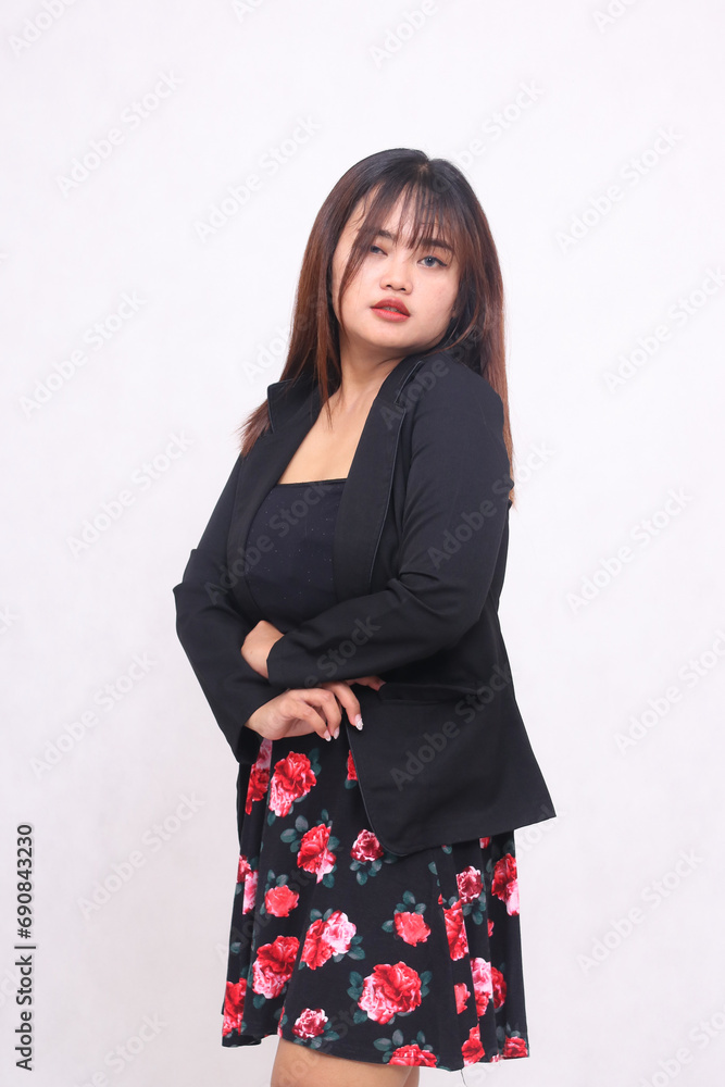Beautiful Asian Indonesian girl in a casual professional office skirt, cheerful smile, crooked right hand, elegant arms on a white background for promotions, advertisements, banners, billboards Beautiful Asian Indonesian girl in a casual professional office skirt, cheerful smile, crooked right hand, elegant arms on a white background for promotions, advertisements, banners, billboards