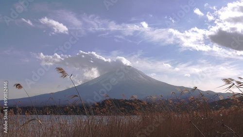 Beautiful view of Mount Fuji and field at Lake Kawaguchi in autumn, This mountain is an famous symbolic of Japan.