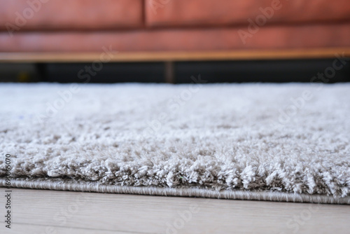 carpet texture background on wooden floor with copy space 