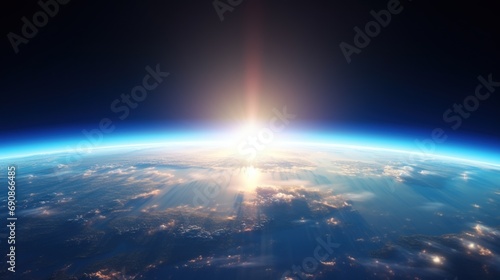 Beautiful sunrise over earth as seen from orbit space view. photo