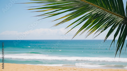 Tropical beach: palm tree, azure waves, clear sky, and bright sand, capturing the beauty of a tropical paradise
