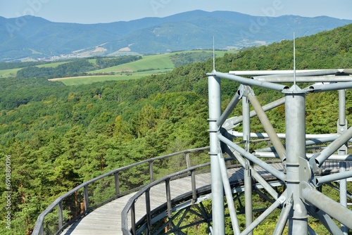 Tourist attraction iron walkway high in the treetops