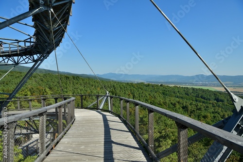 Tourist attraction iron walkway high in the treetops