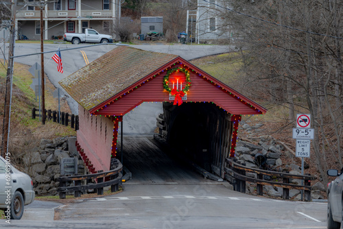 Historic timber one lane covered bridge in the Town of Newfield, Tompkins County NY with holiday lights.	 photo