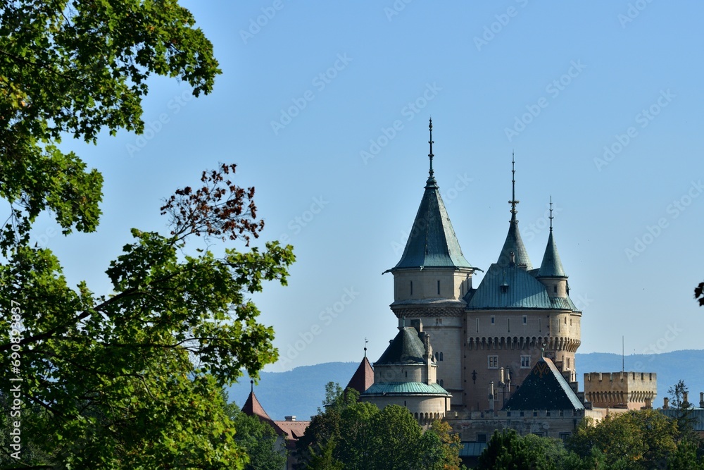 View from behind the trees of the old castle Bojnice Slovakia