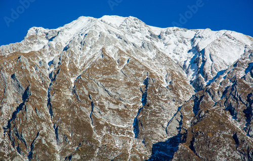 A wonderful sunny but frozen from the cold of the night on the mountains of the Alpago photo