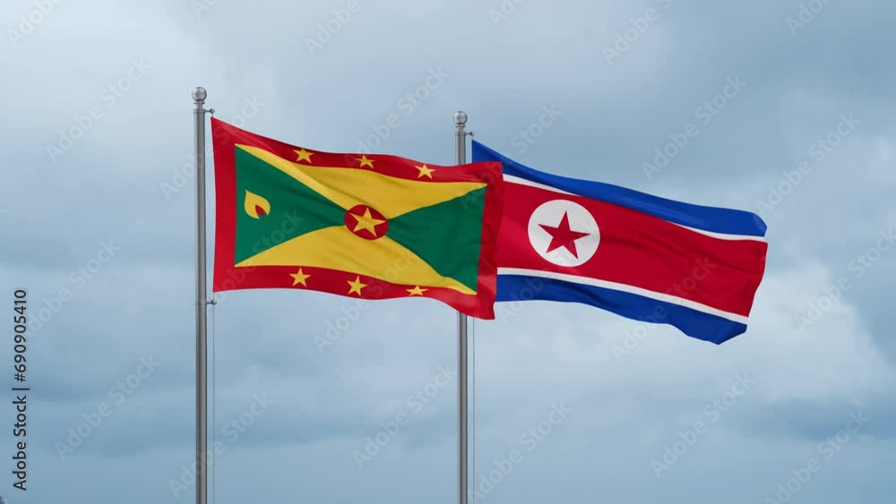 North Korea and Grenada flag waving together on cloudy sky, endless seamless loop North Korea and Grenada flag waving together on cloudy sky, endless seamless loop