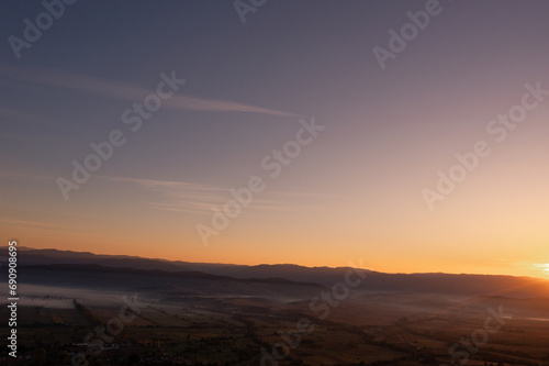 aerial view of foggy morning autumn mountains with clouds bansko bulgaria