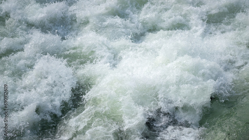 Severe water with turbulence flow and splashing due to heavy weather condition. Nature environmental.