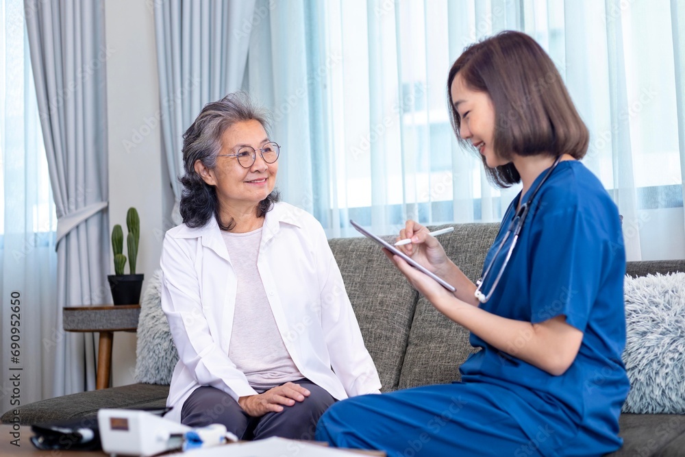 Obraz premium Senior woman get medical service visit from caregiver nurse at home while having result of medical exam for health care and pension welfare insurance