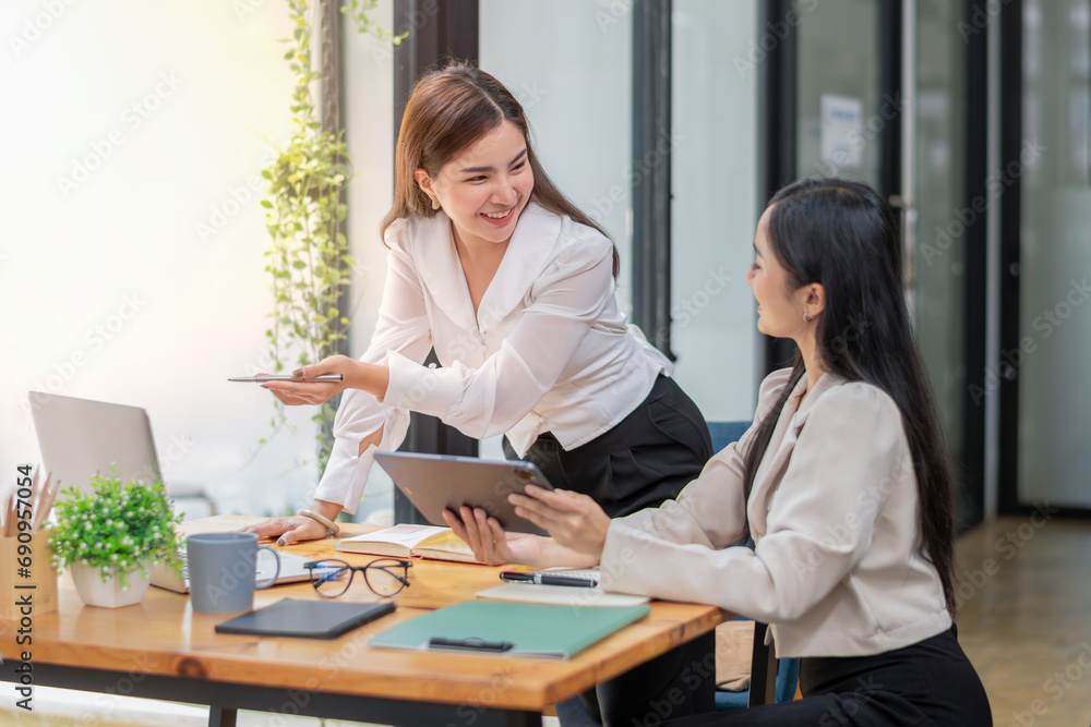 Two business worker consult and plan together. Brainstorm, share, and discuss business project ideas. Two business worker consult and plan together. Brainstorm, share, and discuss business project ideas.